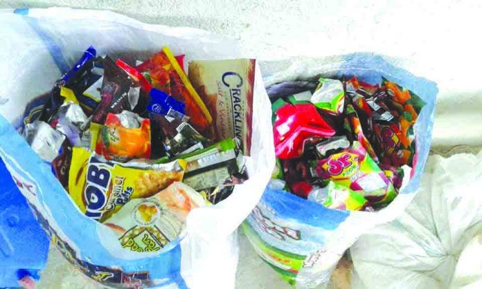 Residents of Caticlan in Malay, Aklan can now to exchange plastic trash for a kilo of rice. Village chief Ralf Tolosa said the project dubbed “Basura Mo, Palitan ko ng Bigas” aims at reducing the volume of plastic wastes their barangay. CONTRIBUTED PHOTO