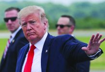 Trump says immigration raids coming ‘fairly soon’ U.S. President Donald Trump returns waves after arriving in Morristown, New Jersey, July 5, 2019. REUTERS