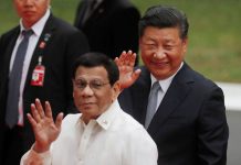 President Rodrigo Duterte (front) and Chinese President Xi Jinping’s verbal agreement allowing Chinese fishermen to trawl within the Philippine exclusive economic zone is “legally binding,” according to Presidential Spokesman Salvador Panelo. ABS-CBN NEWS