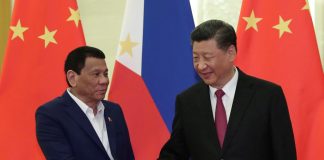 President Rodrigo Duterte (left) has the authority to enter “executive” agreements, including a verbal deal with Chinese President Xi Jinping on fishing rights in the Philippines’ exclusive economic zone, says Presidential Spokesman Salvador Panelo. ABS-CBN NEWS
