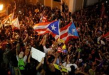 Puerto Rico guv to quit after mass protests Crowds celebrate Governor Ricardo Rosselló’s resignation announcement after days of mass street protests in San Juan, Puerto Rico. REUTERS