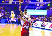 Blackwater Elite’s Rabeh Al-Hussaini attacks the defense of Alaska Aces' Davon Potts for an inside hit. PBA