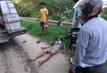 Reynaldo Camral lies lifeless on the ground after falling from the roof of a public utility jeepney on July 11. KISS FM 96.3 LEON
