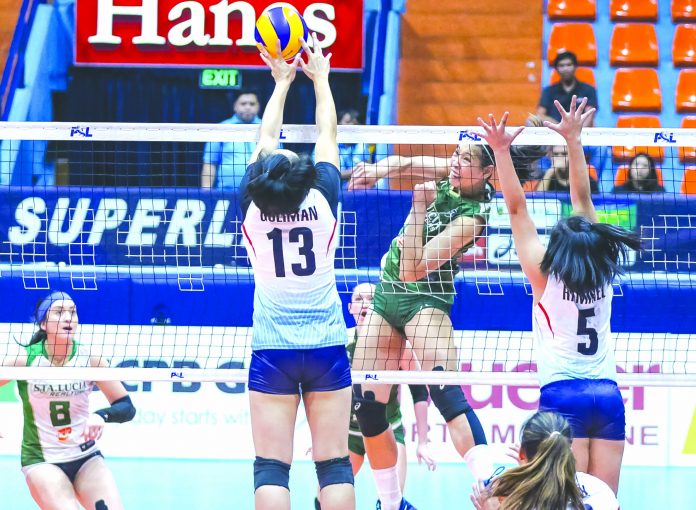 Roselle Baliton Sta. Lucia Lady Realtors’ Roselle Baliton has her shot foiled by Marinerang Pilipina Lady Skippers’ Nica Gulliman. PSL PHOTO