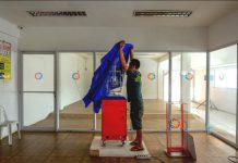 STL AGENTS: ‘HELP US’ STL GAME SUSPENDED. A personnel of ZFIC Gaming Corp. is covering this electronic Small Town Lottery draw machine at its draw center in Jaro, Iloilo City. The Philippine Charity Sweepstakes Office has temporarily halted STL draws and its other numbers games such as the lotto upon the order of President Rodrigo Duterte late Friday night last week due to alleged massive corruption. IAN PAUL CORDERO/PN