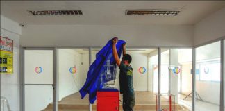 STL GAME SUSPENDED. A personnel of ZFIC Gaming Corp. is covering this electronic Small Town Lottery draw machine at its draw center in Jaro, Iloilo City. The Philippine Charity Sweepstakes Office has temporarily halted STL draws and its other numbers games such as the lotto upon the order of President Rodrigo Duterte late Friday night last week due to alleged massive corruption. IAN PAUL CORDERO/PN