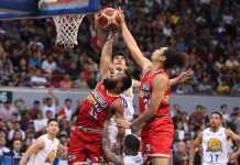 Barangay Ginebra San Miguel Kings’ Stanley Pringle and Japeth Aguilar and TNT KaTropa’s Jeth Troy Rosario battle for the rebound. PBA PHOTO