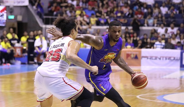 Terrence Jones TNT KaTropa’s Terrence Jones attacks the defense of Barangay Ginebra San Miguel Kings’ Japeth Aguilar. PBA PHOTO