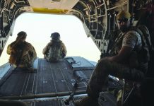 UAE draws down troops in Yemen Emirati soldiers stand guard out the rear gate of a Chinook military helicopter traveling from Saudi Arabia to Yemen in this Sept. 14, 2015 file photo. AP