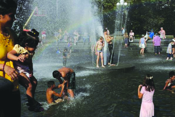 Washington Square Park Families play in the fountain at Washington Square Park in Manhattan, New York, U.S. on July 20, 2019. REUTERS