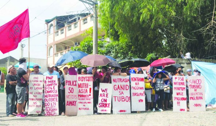 Workers Protest Labor secretary Silvestre Bello III emphasized that the cases of “violence and murder, brutal repression of public protests, and repressive laws” among workers are all allegations as the cited accusations are not officially reported as labor-related incidents. PHOTO FROM ANAKBAYAN UST
