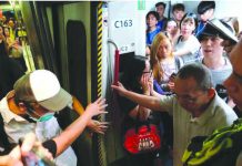 Hong Kong protesters disrupt train services Anti-extradition bill demonstrators block the Mass Transit Railway (MTR) train in Hong Kong, China July 30, 2019. REUTERS
