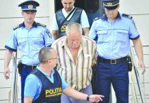 Romania pushes harsher penalties for murder, rape Police officers escort Gheorghe Dinca, the suspect in the case of rape and murder of a 15-year-old girl, from a court in Craiova, southern Romania, Saturday, July 27, 2019. AP