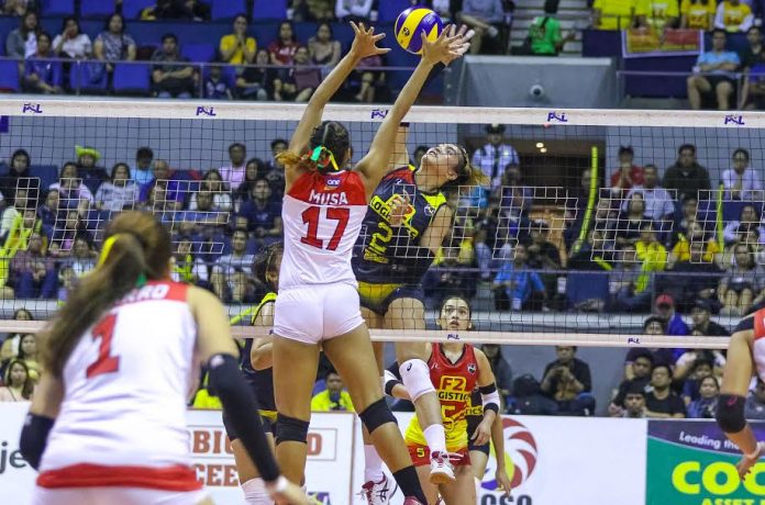 Abigail Marano Ilongga Abigail Marano of F2 Logistics Cargo Movers challenges the defense of Cignal HD Spikers’ Ranya Musa. PSL PHOTO