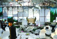 Workers of a wedding hall inspect after a blast in Kabul, Afghanistan Aug., 2019. REUTERS