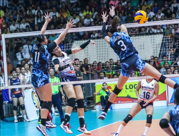 Aiza Maizo-Pontillas of Petron Blaze Spikers Aiza Maizo-Pontillas of Petron Blaze Spikers blasts a shot towards the defense of fellow Ilongga Ma. Shaya Adorador of Foton Tornadoes. PSL PHOTO