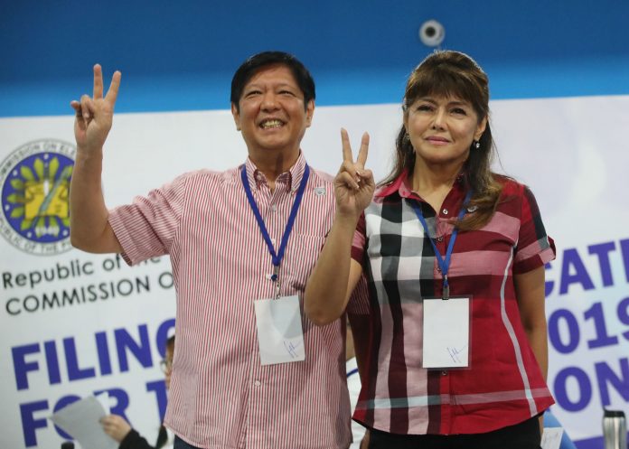 In this October 16 photo, former Sen. Ferdinand “Bongbong” Marcos Jr. accompanies his sister Ilocos Norte Gov. Imee Marcos in filing her certificate of candidacy for senator in the 2019 midterm elections. Anti-graft court Sandiganbayan is set to issue a decision on the P200-billion civil forfeiture. PNA