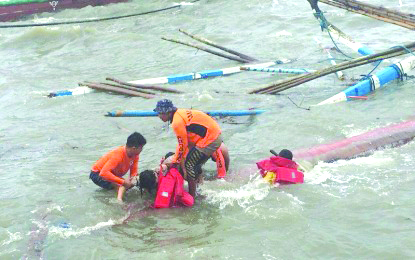 Capsized motorboats Iloilo Strait Search and rescue personnel retrieve the body of a passenger of one of three capsized motorboats, near the Dumangas port between Iloilo and Negros Occidental on Aug. 4. OFFICE OF CIVIL DEFENSE 6