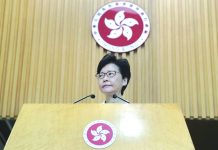 Hong Kong leader vows to narrow rifts Hong Kong Chief Executive Carrie Lam Listens to reporters' questions during a press conference in Hong Kong Tuesday, Aug. 27, 2019. AP