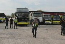LTFRB starts probe on Ceres trips suspension Policemen secure Ceres buses at the Dynamic Builders compound in Barangay Alijis, Bacolod City. ARCHIE REY ALIPALO/PN