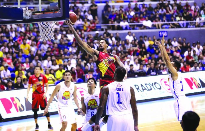 Chris McCullough San Miguel Beermen’s Chris McCullough threads the TNT KaTropa defense for a layup. PBA PHOTO