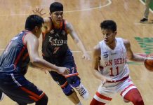 San Beda fends off Letran in NCAA basketball Ilonggo Clint Doliguez of San Beda University Red Lions picked up his dribble after being hounded by two Letran Knights defenders. TIEBREAKER TIMES PHOTO