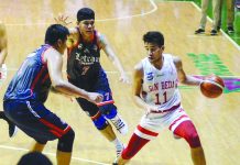NCAA: San Beda fends off Letran Ilonggo Clint Doliguez of San Beda University Red Lions picked up his dribble after being hounded by two Letran Knights defenders. TIEBREAKER TIMES PHOTO