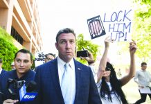 California lawmaker wants corruption trial postponed U.S. Rep. Duncan Hunter, R-Calif., leaves federal court after a hearing in San Diego. Hunter, who is facing corruption charges, wants his Sept. 10 trial postponed while his attorneys appeal a judge's refusal a month earlier to dismiss the case. AP