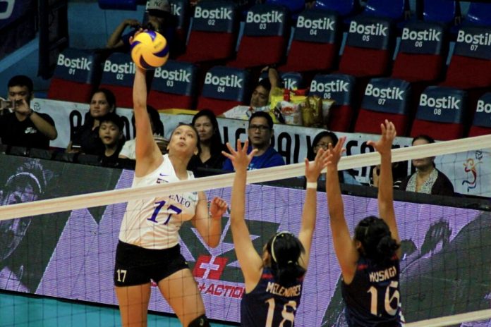 Ateneo Lady Eagles’ Faith Nisperos drops an attack point against the Letran Lady Knights defenders. TIEBREAKER TIMES PHOTO