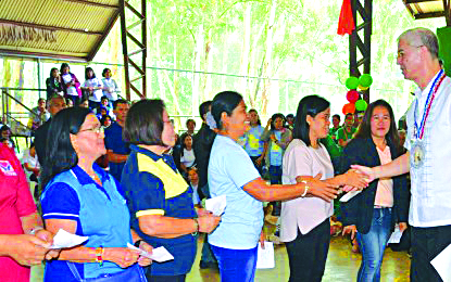 Gov. Eugenio Jose Lacson Negros Occidental Gov. Eugenio Jose Lacson (extreme right) congratulates the inducted officers of the Federation of Day Care Workers/Child Development Workers during their 1st Pasundayag celebration held at the Panaad Covered Court in Bacolod City on Aug. 23. Lacson led the distribution of P10.5 million worth of subsidy to the 1,750 daycare workers of the province. NEGROS OCCIDENTAL PIO