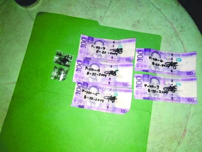Harold Ordas Drugs Antidrug operatives seized these sachets of suspected shabu and marked money from suspected pusher Harold Ordas. PDEA REGION 6