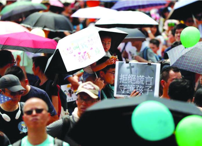 Hong Kong, China Family members participate in a protest rally titled “Guard Our Children's Future” at Edinburgh Place in Hong Kong, China, August 10, 2019. REUTERS