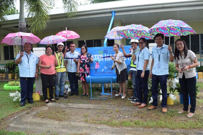 Iloilo Bulk Water Supply Corporation Rainwater Harvester project From Left to right: MIB Deepwell Operation manager Engr. Japhet Gulanes, OIC-school Principal Ms. Jovel Lastimoso, MIB Mechanical Technician Ruther Zapanta, MIB Chief Operating Officer Engr. Rolixto V. Jodieres Jr., Brgy. Kagawad and PTA President Juliet T. Sayo, MIWD board of director chairwoman Dr. Jessica Salas, MIB Electrical Technician Engr. Leomer Navo, MIB Human Resources manager Sheena Marie R. Antonio, MIB Facilities and Plant Maintenance manager Engr. Ariel J. Huyong, Grade V Adviser of Donato Pison Sr. Memorial School JoeAnn Aratea
