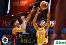 San Sebastian escapes Letran in NCAA basketball San Sebastian College Golden Stags’ JM Calma attacks the Colegio de San Juan de Letran Knights defender for an inside hit. TIEBREAKER TIMES PHOTO