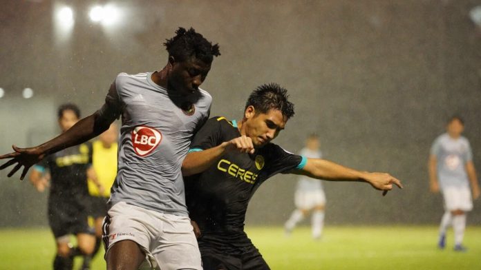 Jordan Mintah Kaya Futbol Club-Iloilo’s Jordan Mintah tangles with Ceres-Negros FC’s player for the ball. KAYA-ILOILO PHOTO