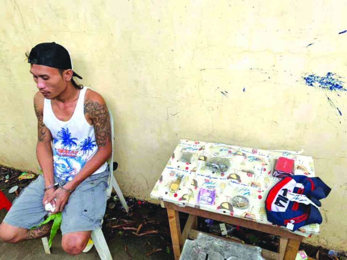“Habal-habal” driver Jovanie Toquero was caught in an entrapment operation. He sold a sachet of suspected marijuana to a poseur-buyer around 5 a.m. on Aug. 2. BOY RYAN ZABAL/AKEANFORUM