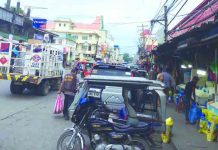This sidewalk in downtown Kalibo is being used as tiangge, parking area, sari-sari store, and house extension. A municipal transportation task force was recently created to clear all erring structures illegally erected in public roads in the capital town. BOY RYAN ZABAL/PN