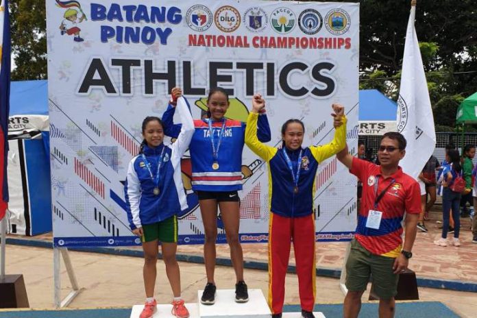 Krisha Dedoyco Aguillon (center) captures the gold medal in the girls 100-meter dash event of the ongoing Batang Pinoy National Finals 2019 in Puerto Princesa City, Palawan. PHOTO COURTESY OF CHE GUEVARRA