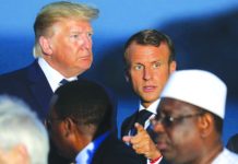 Trump caught off guard as Iran’s Zarif visits G7 summit U.S. President Donald Trump (L) and France’s President Emmanuel Macron talk prior to a family picture with G7 leaders and guests, on the second day of the annual G7 summit in Biarritz, south-west France on Aug. 25, 2019. AFP