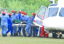 Dead Irish girl’s family wants thorough probe in Malaysia A body believed to be 15-year-old Irish girl Nora Anne Quoirin who went missing is brought out of a helicopter in Seremban, Malaysia, Aug. 13, 2019. REUTERS