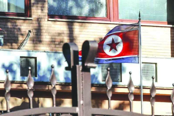 North Korea The flag of North Korea waves inside the compound of the North Korean embassy in Rome, Italy in this Jan. 3, 2018 file photo. South Korea's spy agency on Thursday, Aug. 1, 2019, has told lawmakers that a North Korean diplomat who went into hiding in Italy last year is now under protection outside the country. AP