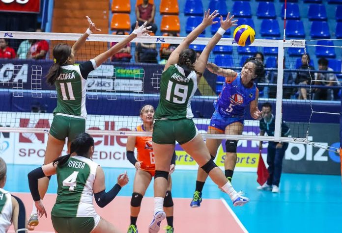 Bacolodnon Patty Jane Orendain of Generika-Ayala Lifesavers scores against the defense of Sta. Lucia Lady Realtors’ Amy Ahomiro. PSL PHOTO