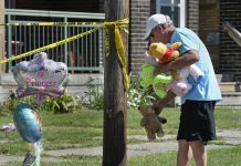 5 children killed in Pennsylvania fire Paul Laughlin, 57, places stuffed animals on Sunday, Aug. 11, 2019 outside a home at 1248 West 11th St. in Erie, Pa., where multiple people died in an early-morning fire. TIMES-NEWS VIA AP