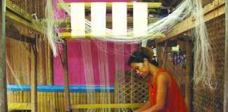 A woman loom-weaves piña fiber in Kalibo, Aklan. “Piña” fiber is extracted from the leaves of a pineapple plant. The fibers are ivory-white in color and naturally glossy. The cloth is translucent, soft and fine with high luster. PHILIPPINE FOLKLIFE MUSEUM FOUNDATION