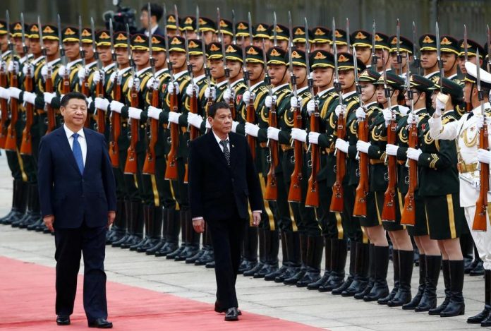 President Rodrigo Duterte and President Xi Jinping President Rodrigo Duterte (right) and Chinese President Xi Jinping attend a welcoming rites during the former’s first state visit in Beijing, China on Oct. 20, 2016. REUTERS/THOMAS PETER