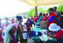 RELIEF DRIVE: 1,054 families in Gigantes receive aid RELIEF OPERATION. Personnel of the Department of Social Welfare and Development distribute relief goods to residents of Barangay Lantangan in Isla Gigantes, Carles, Iloilo on Aug. 10. IAN PAUL CORDERO/PN