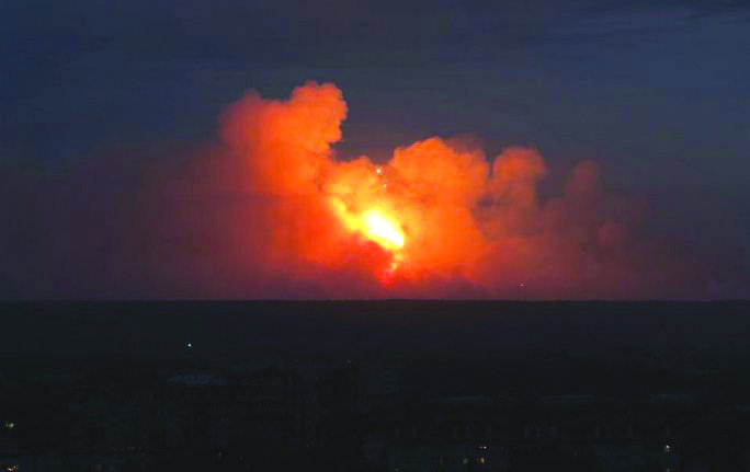Siberia explosion A view shows flame and smoke rising from the site of blasts at an ammunition depot near the town of Achinsk in Krasnoyarsk region, Russia August 5, 2019. REUTERS