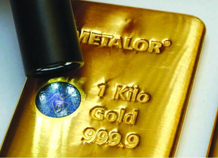 Sicpa Oasis The Sicpa Oasis validator system (bullion protect) is pictured on one kilogram bar of gold at Swiss refiner Metalor in Marin near Neuchatel, Switzerland July 5, 2019. REUTERS