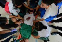 Spirit possession? 11 ‘wild’ students disrupt classes STRANGE HAPPENING. Teachers and students of Iloilo City National High School help one another restrain this high school girl who became unusually strong and uncontrollable. She was one of 11 students who behaved strangely yesterday morning, Aug. 22, 2019. Were they possessed by evil spirits? IAN PAUL CORDERO/PN