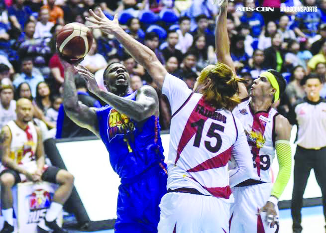 Terrence Jones TNT KaTropa’s Terrence Jones was double teamed by San Miguel Beermen’s June Mar Fajardo and Arwind Santos. ABS CBN SPORTS PHOTO
